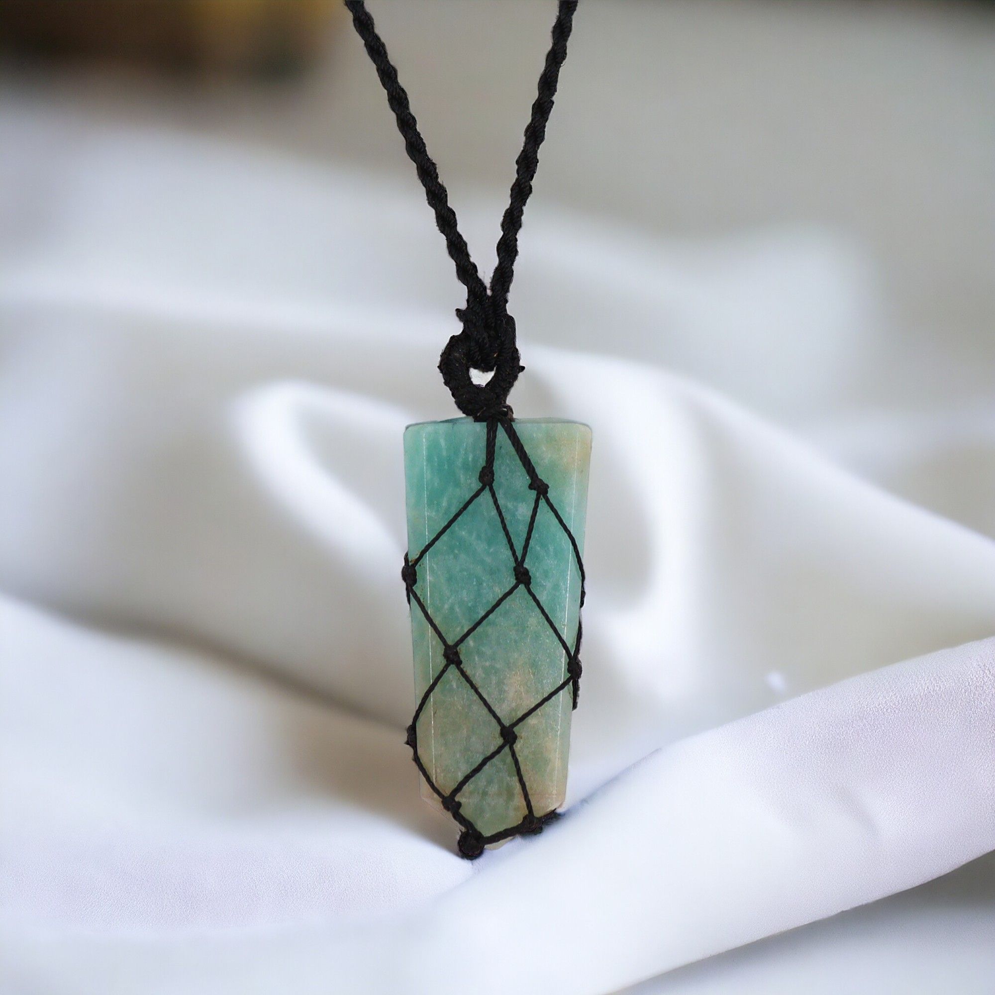 Colgantes de piedras Preciosas entrelazados