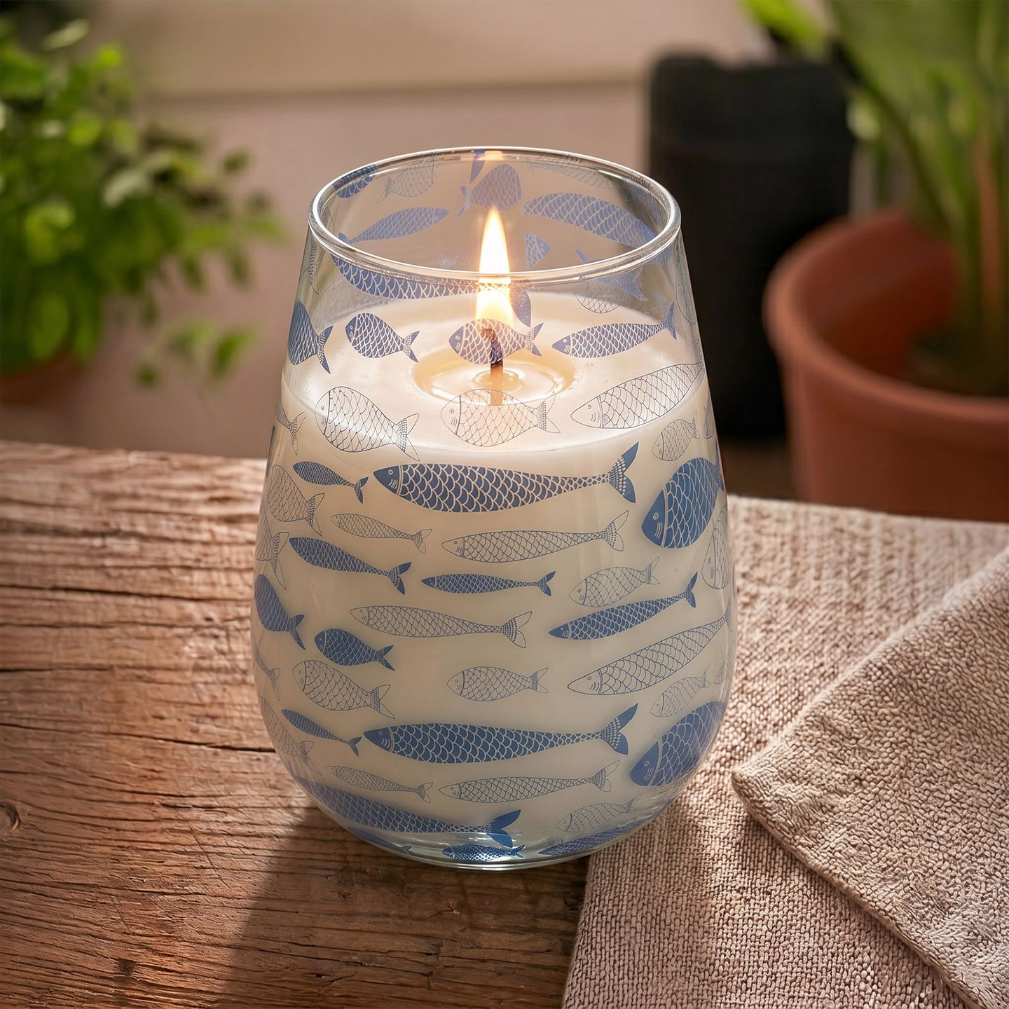 Velas en frascos de vidrio