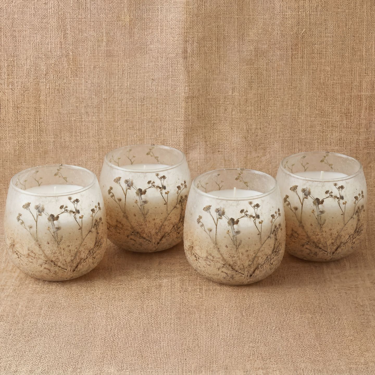 Velas en frascos de vidrio