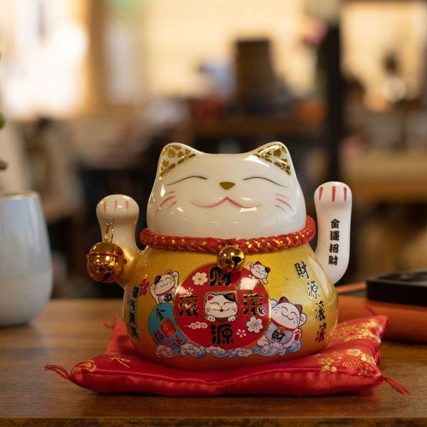 Hucha de Cerámica con forma de Gato - Dorada sobre cojín (pila no incluida)